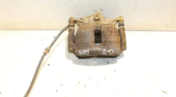 Volkswagen Golf VII Front brake caliper