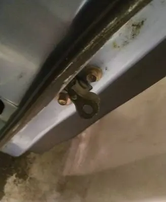 Rear door check strap stopper