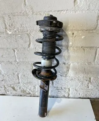 Volkswagen Jetta V Front shock absorber with coil spring 1t04130310