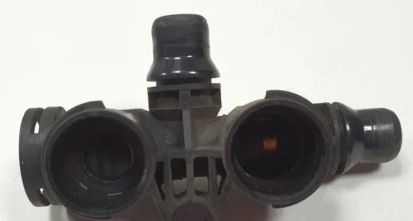 Thermostat/thermostat housing