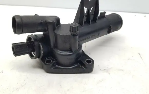 Thermostat/thermostat housing
