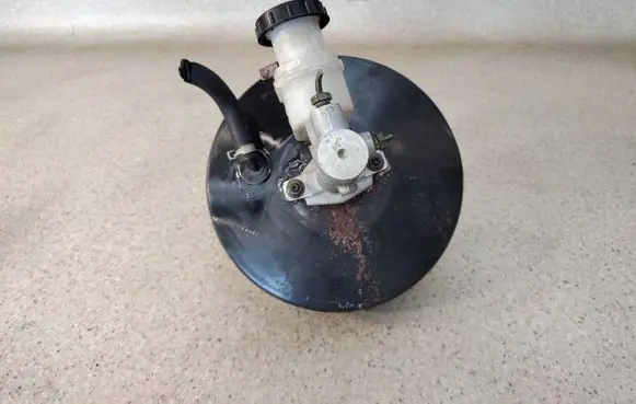 Nissan Almera N16 Brake booster 47210BM410