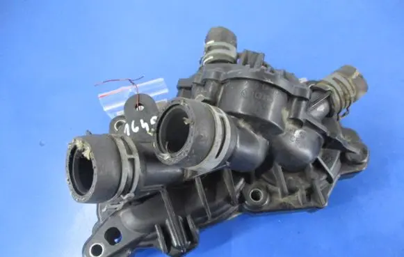 Thermostat/thermostat housing