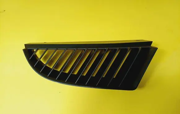 Mitsubishi Colt Front bumper upper radiator grill MN127774