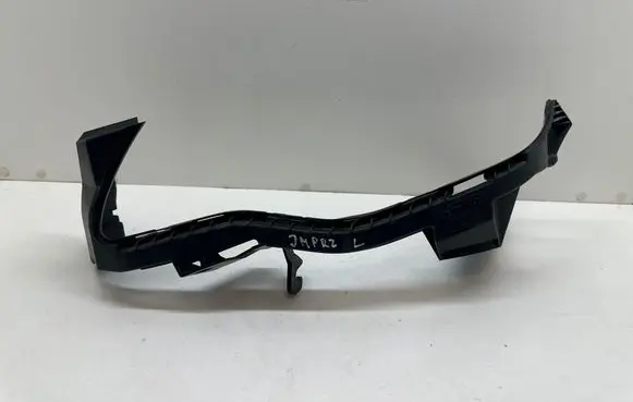 Subaru Impreza IV Headlight/headlamp mounting bracket 