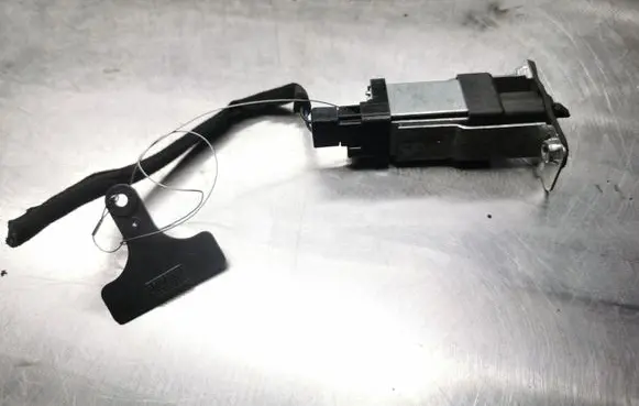 Fuel tank cap lock motor