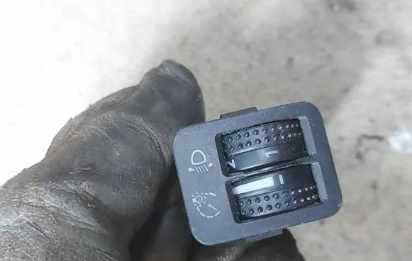 Headlight level height control switch