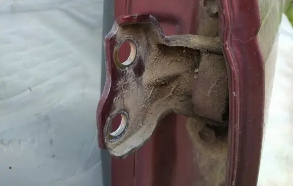 Suzuki Baleno EG Rear door lower hinge