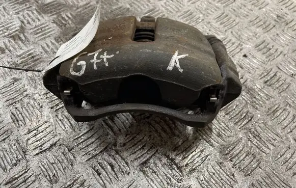 Volkswagen Golf VII Front brake caliper