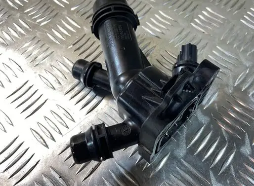Thermostat/thermostat housing