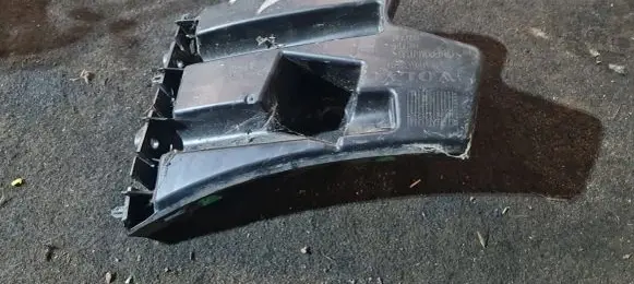 Front bumper mounting bracket