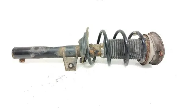 Volkswagen Golf VII Front shock absorber with coil spring 5Q0413023FH