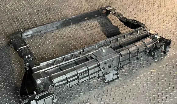 Top upper radiator support slam panel