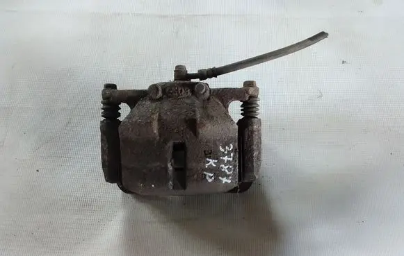 Nissan Qashqai+2 Front brake caliper 41011JD00A