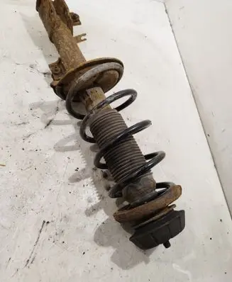 Suzuki SX4 Front shock absorber with coil spring
