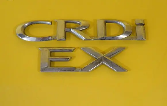 KIA Carens II Manufacturers badge/model letters 