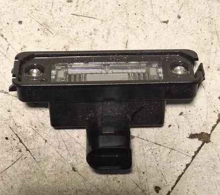 Volkswagen Golf V Number plate light 1J6943021B