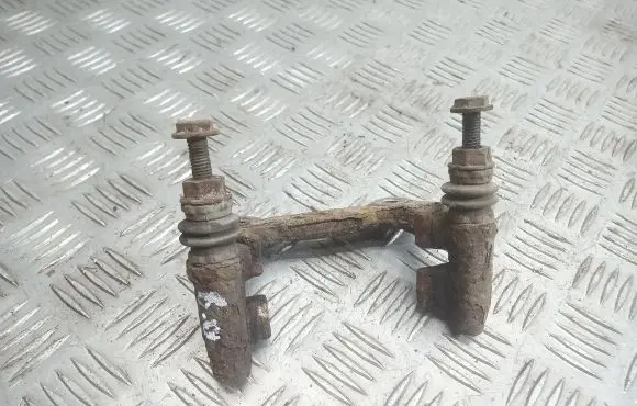 Volkswagen PASSAT B5 Brake caliper pad carrier rear 
