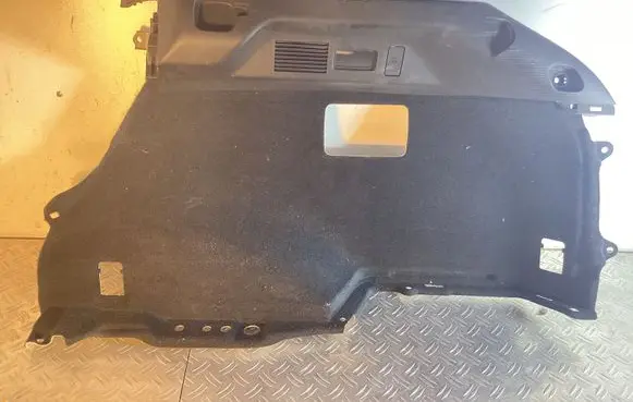 Trunk/boot lower side trim panel