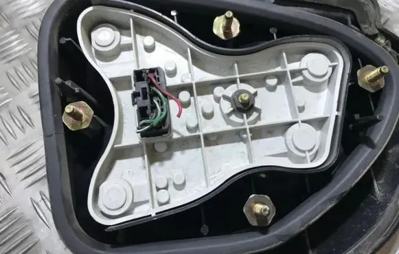 Mitsubishi Carisma Tail light bulb cover holder
