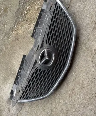 Mazda MPV Front bumper upper radiator grill LE43B0712