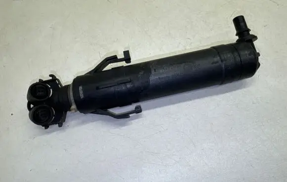 Volkswagen PASSAT B7 Headlight washer spray nozzle 3AA955104