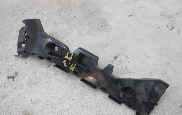 Mazda 3 II Rear bumper mounting bracket BHN9502H1