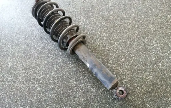 Front shock absorber with coil spring