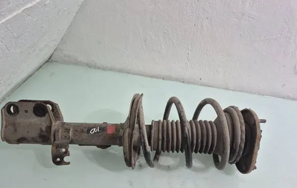 Toyota Avensis T250 Front shock absorber with coil spring 