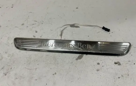 Front sill trim cover