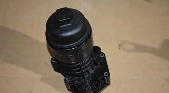 Porsche Cayenne (9Y0 9Y3) Oil filter cover 06M115401K55