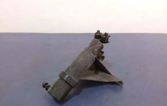 Volkswagen Touran I Windshield washer spray nozzle 1T0955978