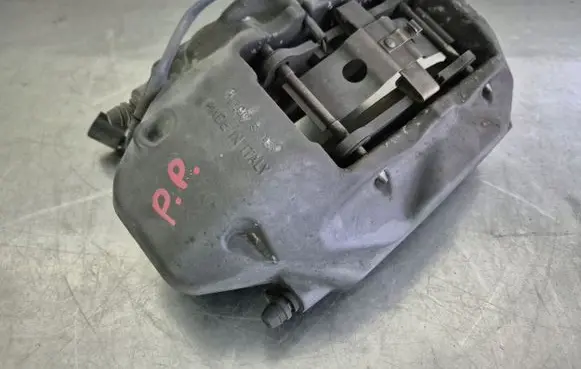 Volkswagen Touareg II Front brake caliper 7P6615106AE