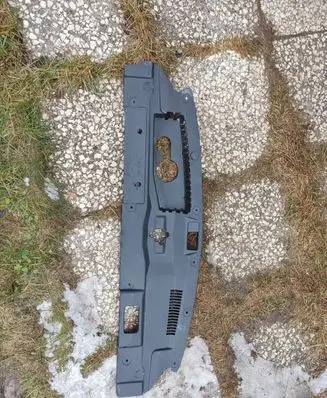 Engine bonnet/hood lock trim molding