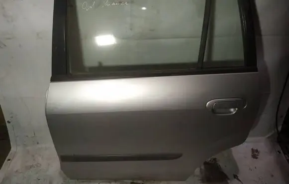 Mazda Premacy Rear door pilkos