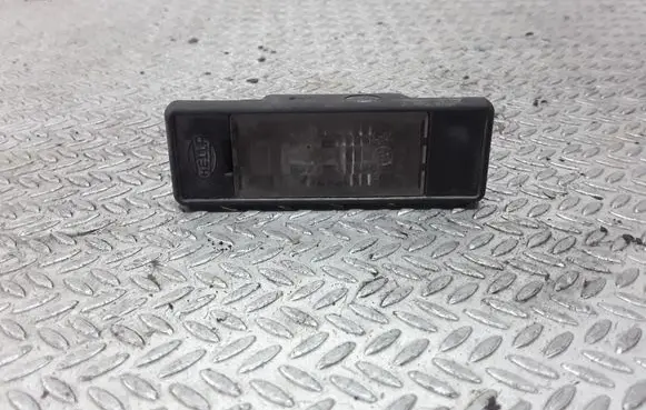 Nissan Primera Number plate light 2KA008224