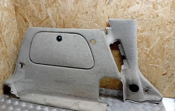 Trunk/boot lower side trim panel