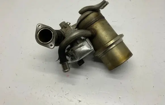 Volkswagen Caddy EGR valve cooler 04L131512G