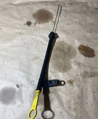 Oil level dip stick