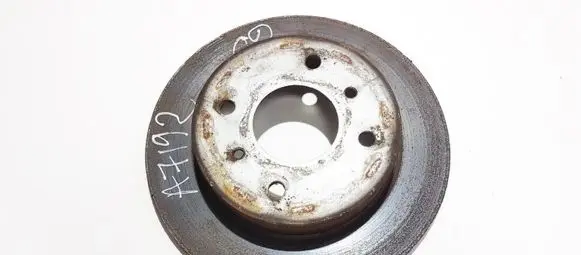 Nissan Almera N16 Rear brake disc neventiliuojamas