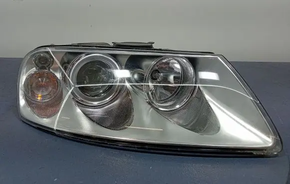 Volkswagen Touareg I Headlight/headlamp 08-341-1119R