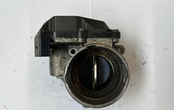 Volkswagen Golf V Throttle valve 03G128063M A2C53324665