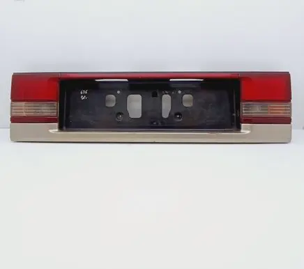 Trunk door license plate light bar