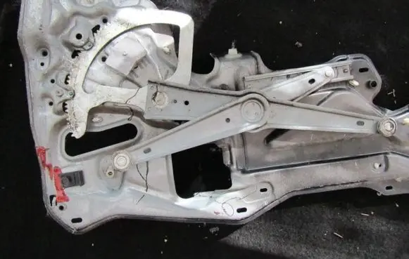 Renault Laguna I Sliding door window regulator with motor 7701672416
