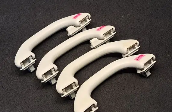 Skoda Yeti (5L) A set of handles for the ceiling 5L6857607B 5L6857607A