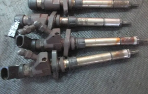 Ford Mondeo MK IV Fuel injector 9657144580 JJ2463836