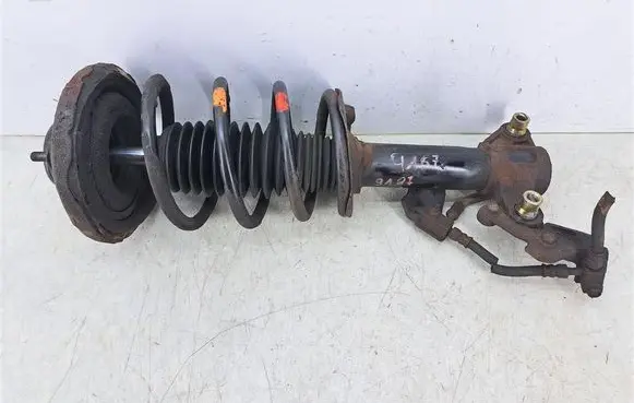 Nissan Primera Front shock absorber with coil spring