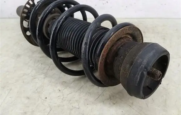 Skoda Fabia Mk2 (5J) Front shock absorber with coil spring 