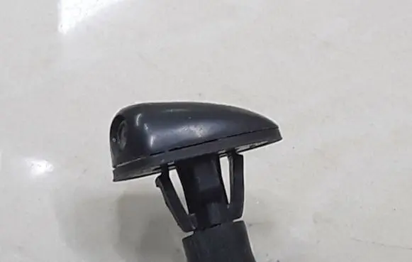 Windshield washer spray nozzle