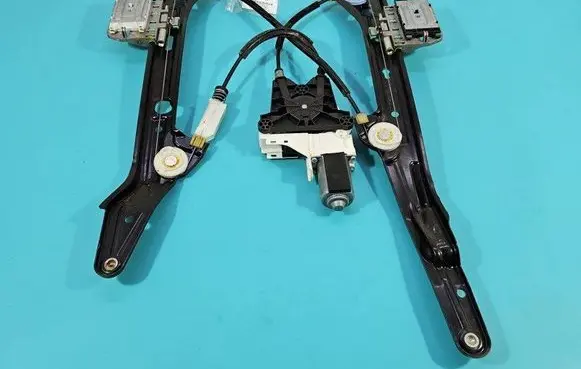 Rear door window regulator with motor